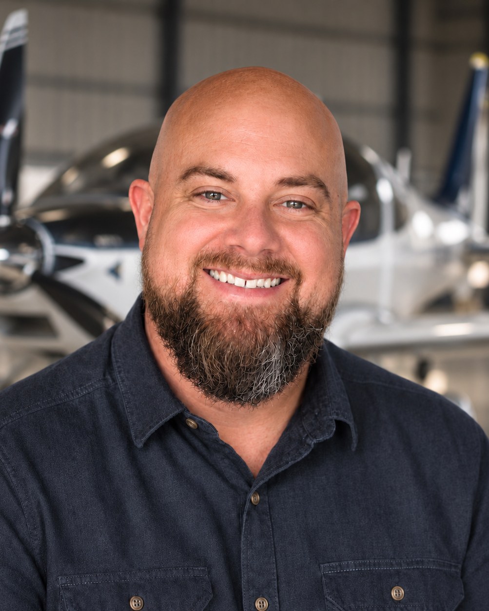 Jarred Elliott in a hangar